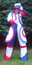 Stiltwalker in Olympic colours