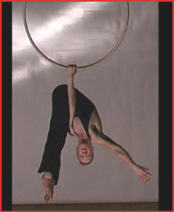 Arch in the Sky - aerialist with hoops