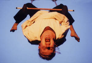 The straitjacket escape, hanging upsidedown