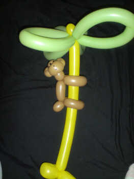 Ballon model of monkey climbing a tree