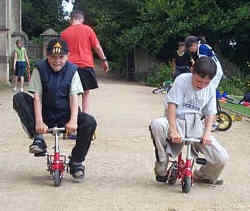 Having a race on the smallest mini bikes around.