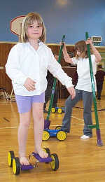 Having fun on the pedal go and stilts.