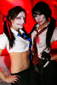 Dead Schoolgirls - stiltwalkers for clubs etc from circusperformers.co.uk and aurorascarnival.co.uk