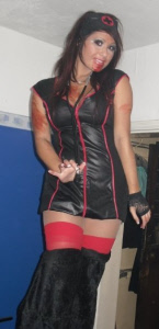 Evil Nurse stiltwalkers for Halloween club nights from circusperformers.co.uk and aurorascarnival.co.uk