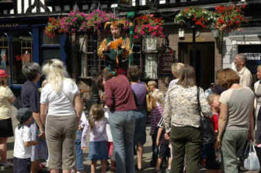 Jack Green models balloons for a crowd.