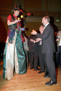Jack Green juggling on stilts at a corporate event