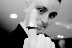 Szymon with coin on finger