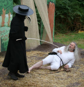 Stage production Plague Doctor and victim