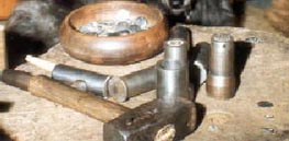Some of the tools used in hammering coins.