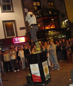 Chris Cross straitjacket escape in the street