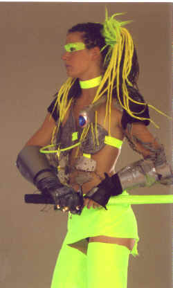 Jentheroo in flourescent stilt club costume.