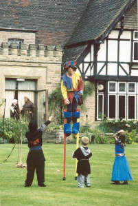 Kris entertains children at a medieval wedding arranged by Princess Valaria of Fantaysia.