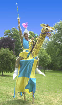 Sir Tariq, stiltwalking knight riding his giraffe.