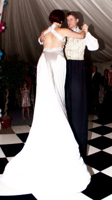 Dancing couple stiltwalkers