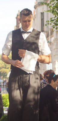 waiter on stilts
