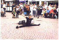 AJ entertains shoppers in Chester with the splits.