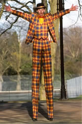 A bright colourful stiltwalking costume.