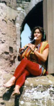 Lynn plays the recorder perched on a window in Ludlow Castle.
