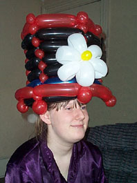 A Fuzzy balloon hat - one of many amazing models which he makes.