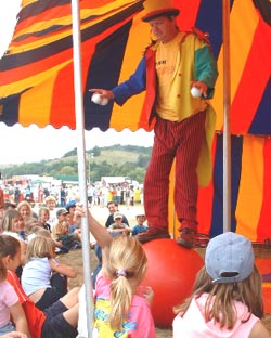 Jonathan juggles whilst on the walking globe