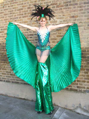 Megan Jones - stiltwalker and fire performer available for any event.