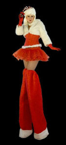 Stilt walking Miss Santa
