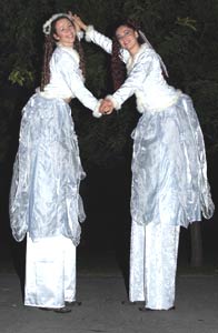 A couple of stiltwalking faries from Surface Tension.